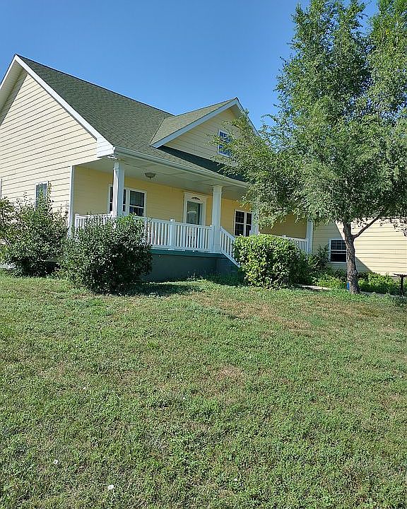Looking at house from NE
