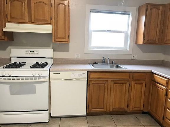 Kitchen with gas stove and dishwasher