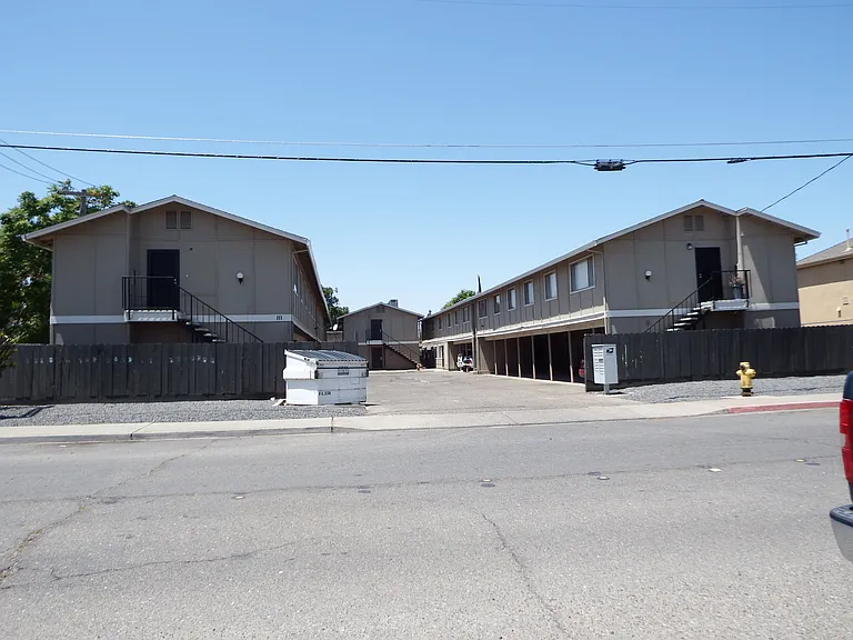 Building Exterior. Each apartment has individual covered parking stall