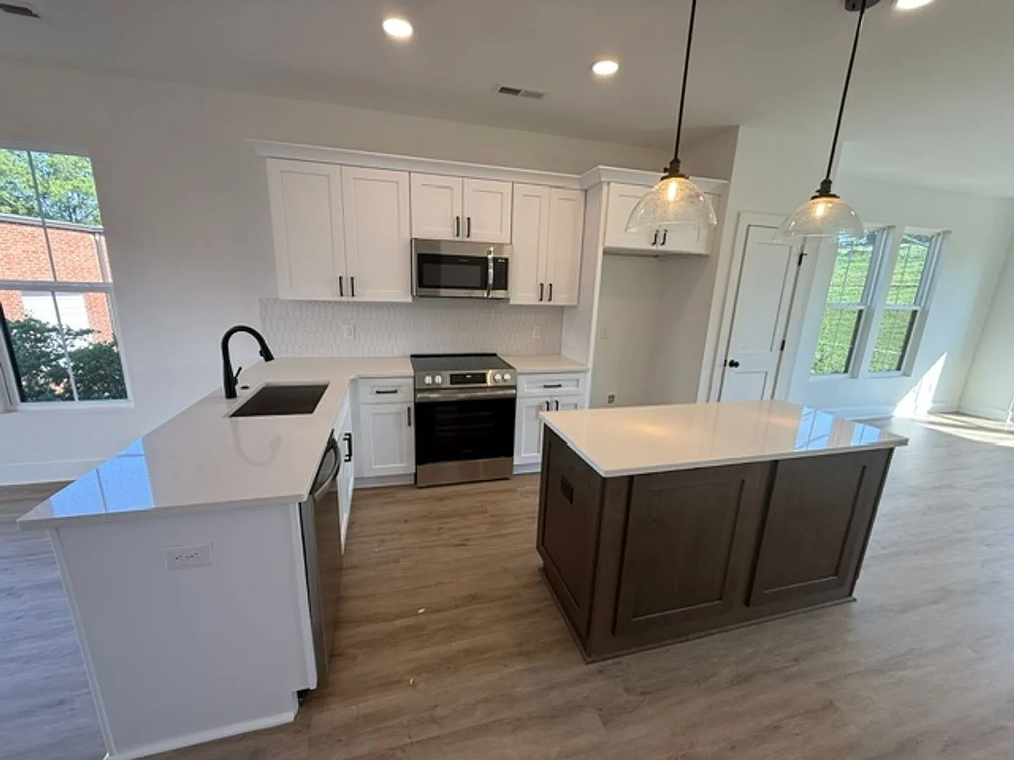 2 BR/2.5BA | Modern End Unit Townhome| 2-Car Garage + rooftop terrace | — Photo 4