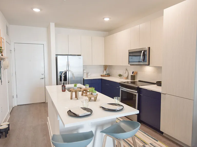 Chef-inspired kitchen with undermount sink, pull-down faucet, and plenty of pantry space