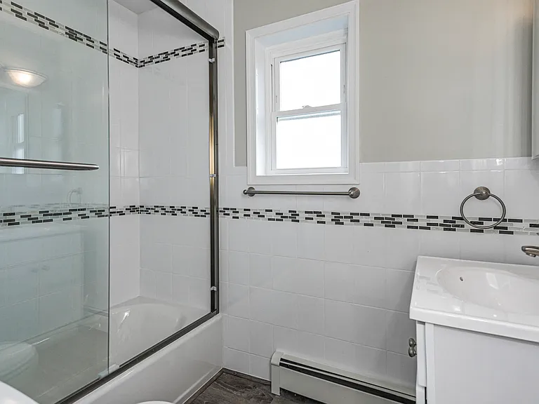 Newly renovated bathrooms with silver finishes