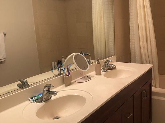 Double sink vanity bathroom inside master bedroom