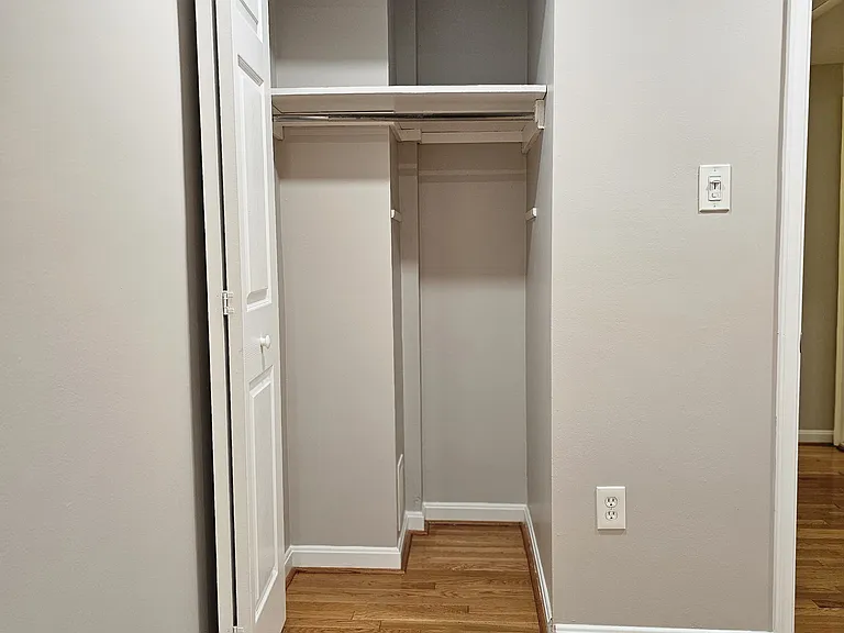 2nd bedroom closet with storage space