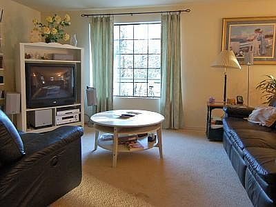 Unique charm and style all throughout! This living room offers wall to wall comfort with a cozy free