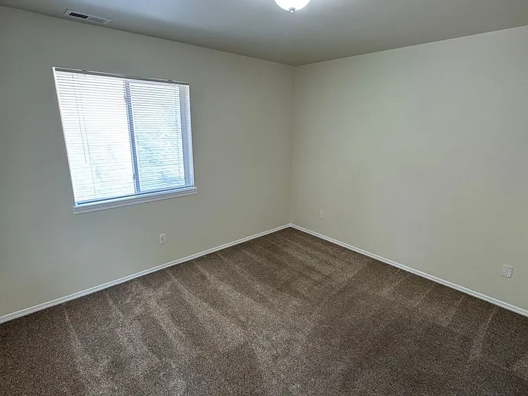 4997 SW Roseberry St — Photo 14