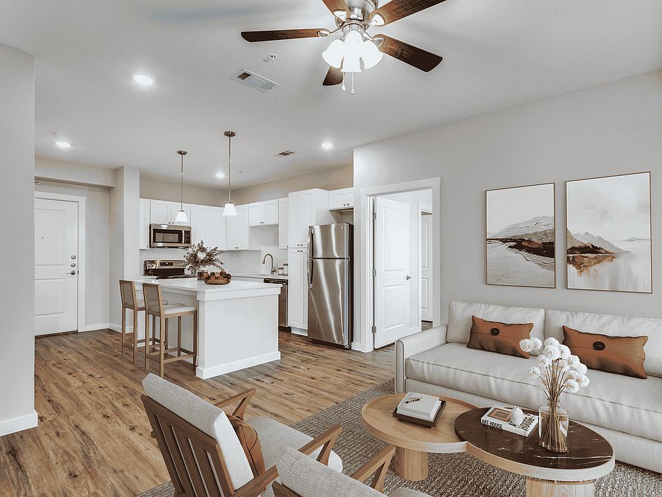 Meet seamless design in this stylish living area and kitchen combo.