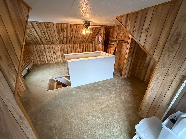 Third floor. Great as a third bedroom, game room or storage.