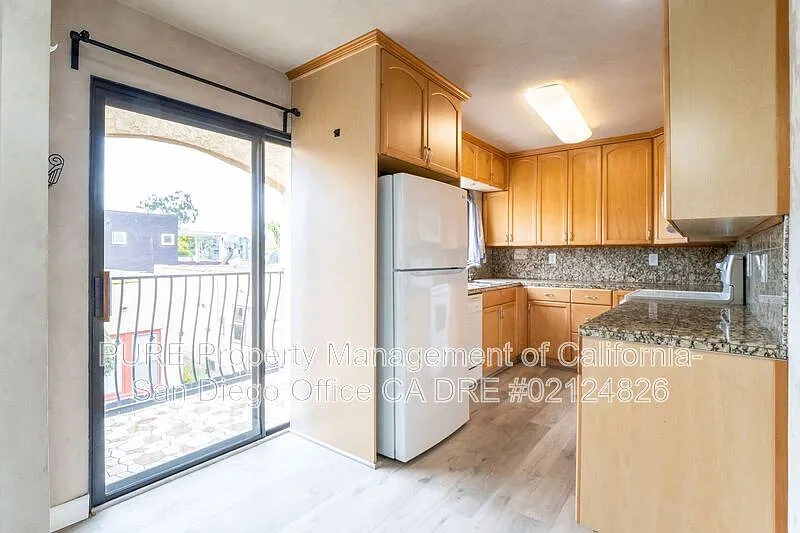 Building Photo - 4383 Kansas St #6