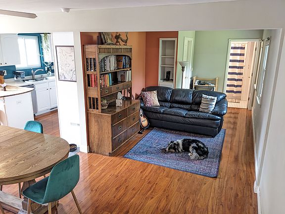 Living room and access to first floor bathroom and bedroom. (Dog not included)