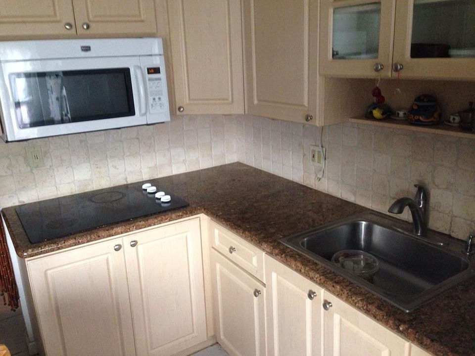 Granite Counter tops, flat glass surface stove, built in mic