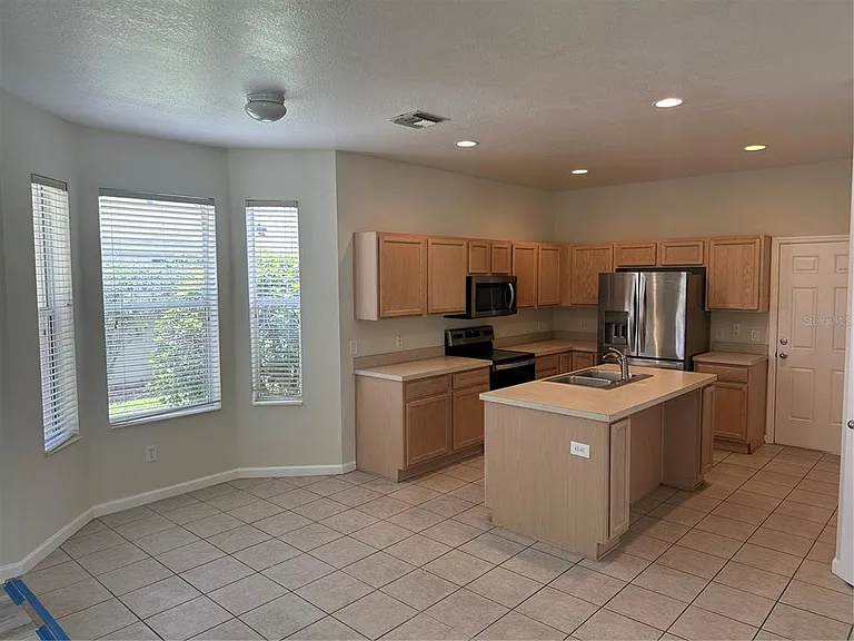 5097 SW 40th Pl — Photo 7