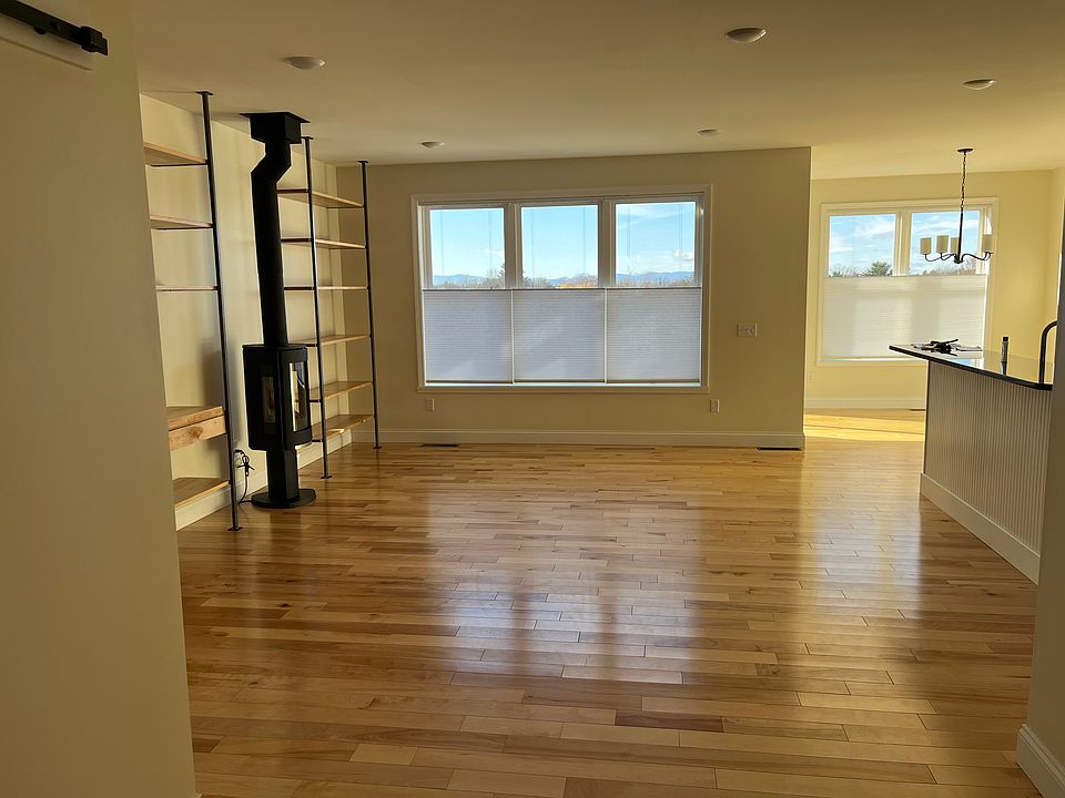 Living room and kitchen looking west to the sunset