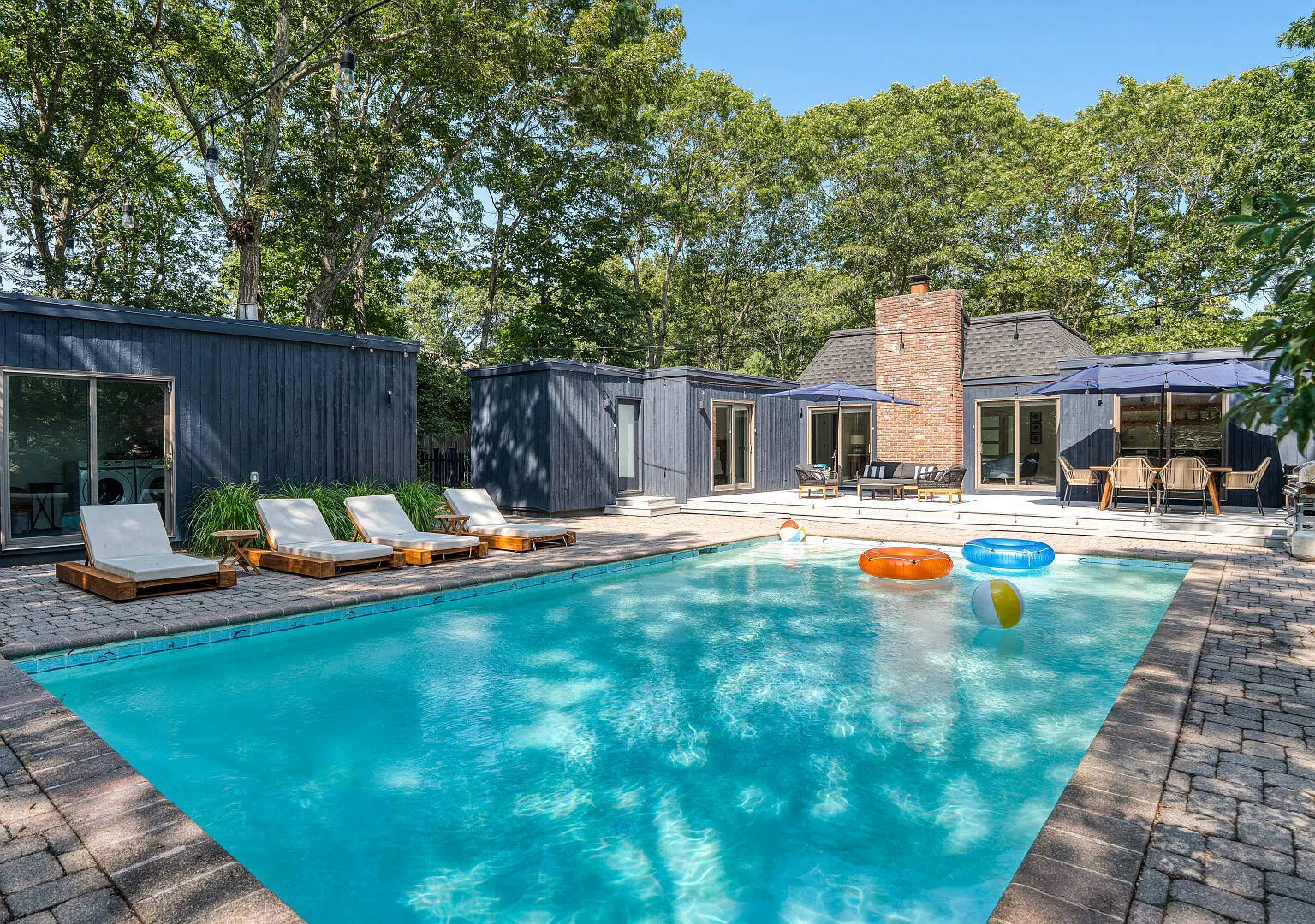Chic Southampton Retreat: Heated Pool & Indoor-Outdoor Living — Photo 1