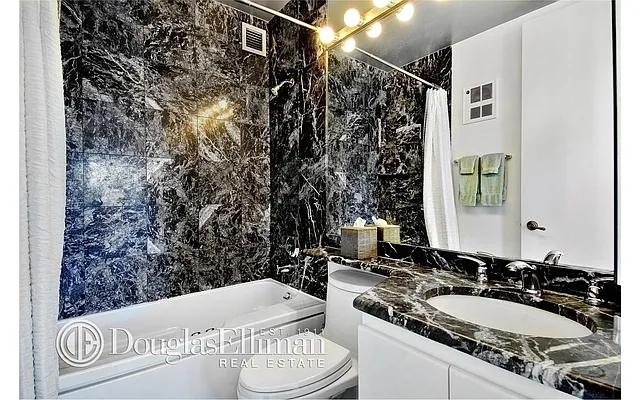 Sold by Douglas Elliman | media 12