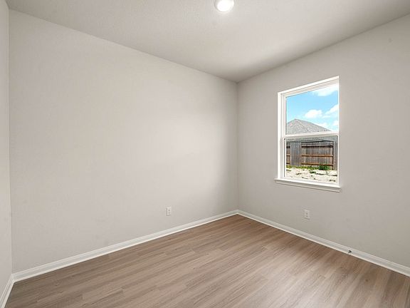 The spacious dining room is ready for all your dinner parties!