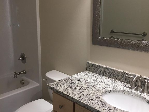Guest bath with granite and brushed nickel