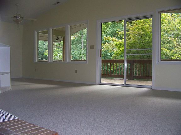 Spacious Living/Dining space with wall of windows