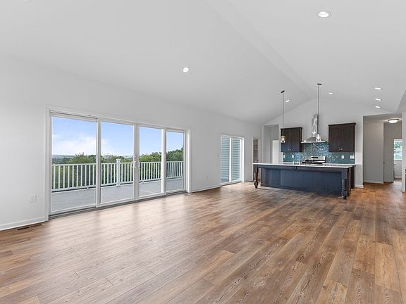 Great Room with Added Sliding Glass Doors and Extended Deck