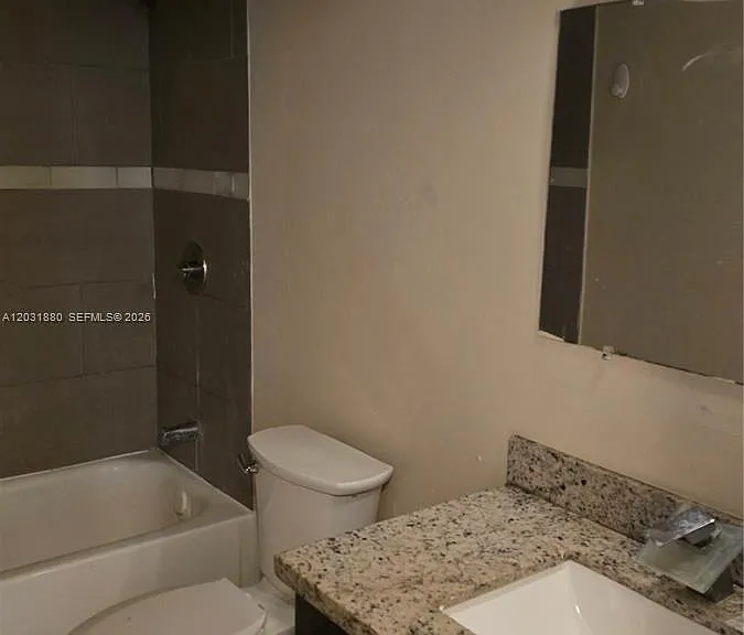 1450 NE 191st St #106 — Photo 7