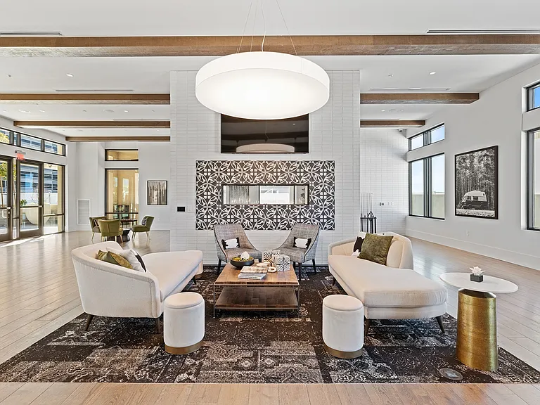 Relax and recharge in this modern, light-filled resident lounge.