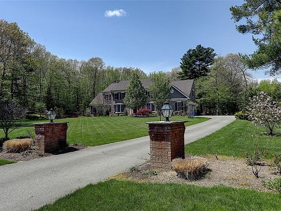 Brick Monument Pillars with Lights. 3 Car Attached Garage. 1 Acre. Town Water.