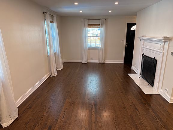 Large living room 23 x 12. Newer windows throughout.