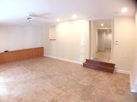 Living room, looking down hallway to kitchen, 2 bedrooms, 1 bath and laundry room.