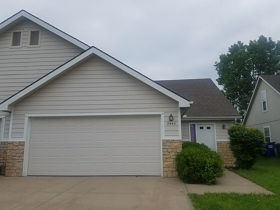 Exterior photo with oversized two car garage.