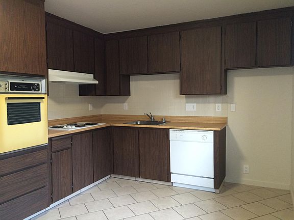 Kitchen With Lots of Cupboards & Tile Floor