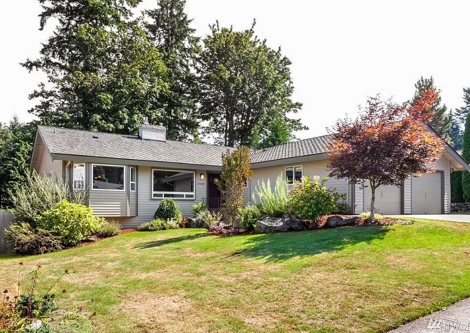 Welcome home to Fairwood Greens! This spacious 4 bedroom, 3 bath home is a hidden gem on the course! You'll find updates throughout, including a gorgeous kitchen, beautiful floors, white millwork & crown molding. The updated, open concept kitchen and sunny family room are a wonderful gathering places. The kitchen features ample counterspace, storage, stainless steel KitchenAid appliances, beautiful cabinets and counters. You'll also enjoy a spacious living and dining room with views to the lovely landscape and golf course beyond. Situated on the 16th hole, enjoy the tranquil setting and expansive view. The main-floor master suite features an ensuite bath with a wall of closets and updated bath. There are two additional guestrooms on the main floor, and one on the lower. The lower floor is a sprawling space with a bedroom, bath, a huge recroom plus multiple bonus spaces and a slider leading out to a covered patio. Great potential for a separate living space! 