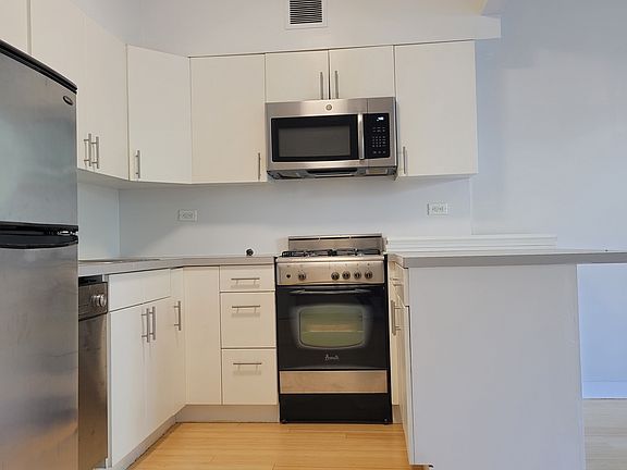 2nd image of 252 E 2nd St APT 3H