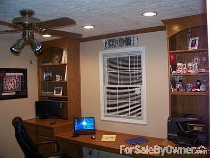 Main floor private office with built-ins
