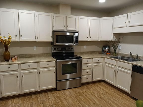 updated spacious kitchen with stainless steel appliances