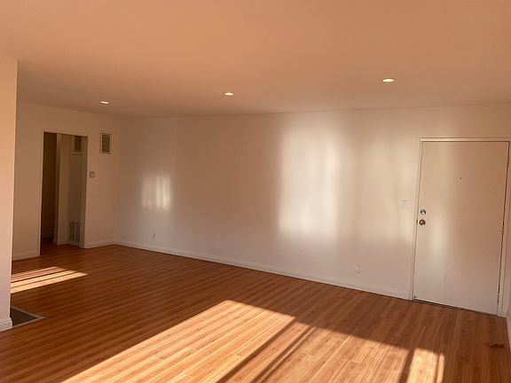 Main living space features recessed lighting