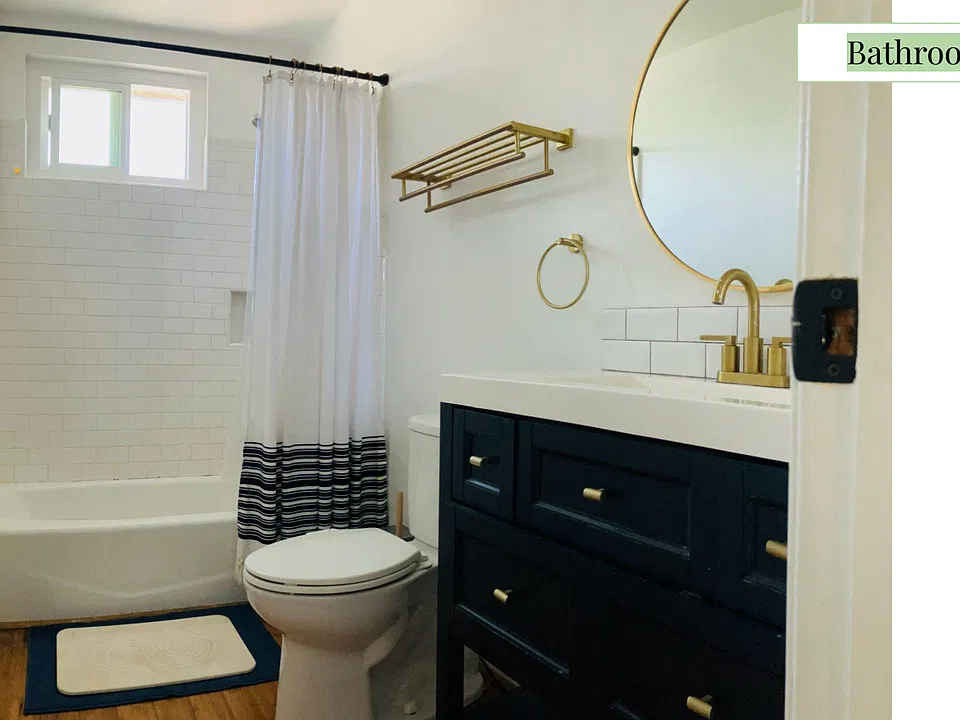 Full bath, all new tile, vanity, fixtures.