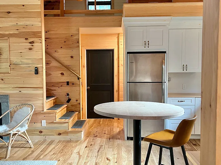 Four stools included.