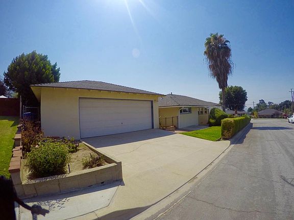 Side door on Granite st. showing two car garage and side ent