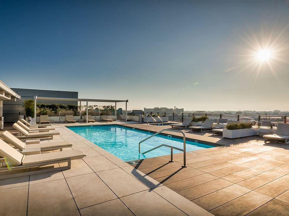 rooftop pool with lounges, cabanas, bbqs etc.