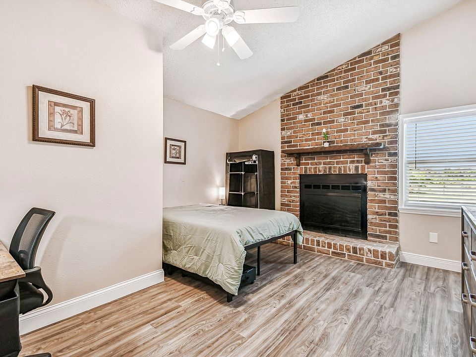 High vaulted ceilings with non functioning fireplace.