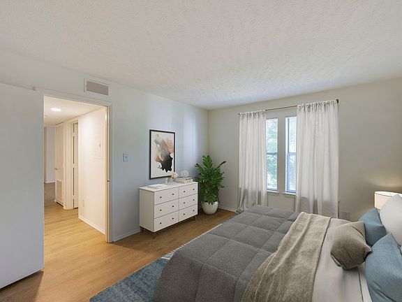 Renovated Meadows II bedroom with hard surface flooring