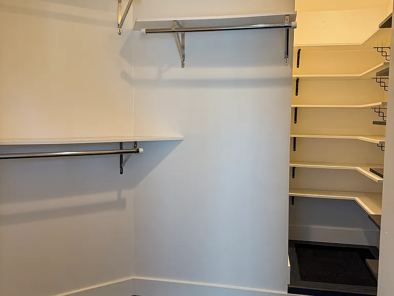 Main bedroom walk in closet.