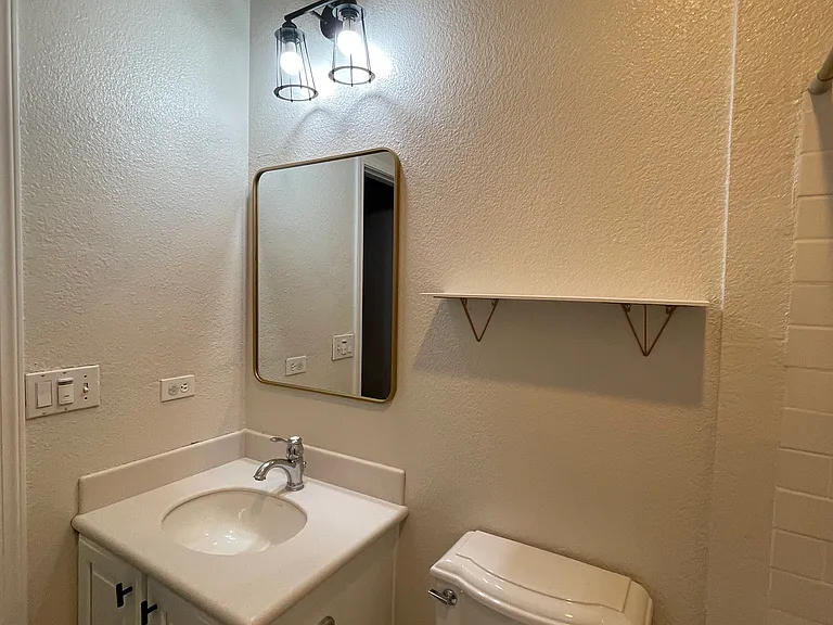 2nd Bedroom Full Bathroom - this view is from the bathub/shower