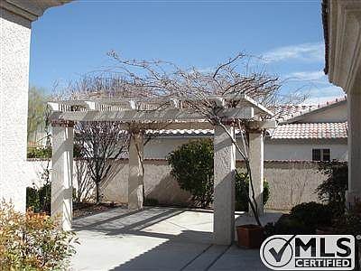 Front courtyard with covered patio