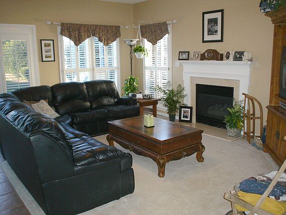 Family Room with Fireplace & Plantation Shuttes
