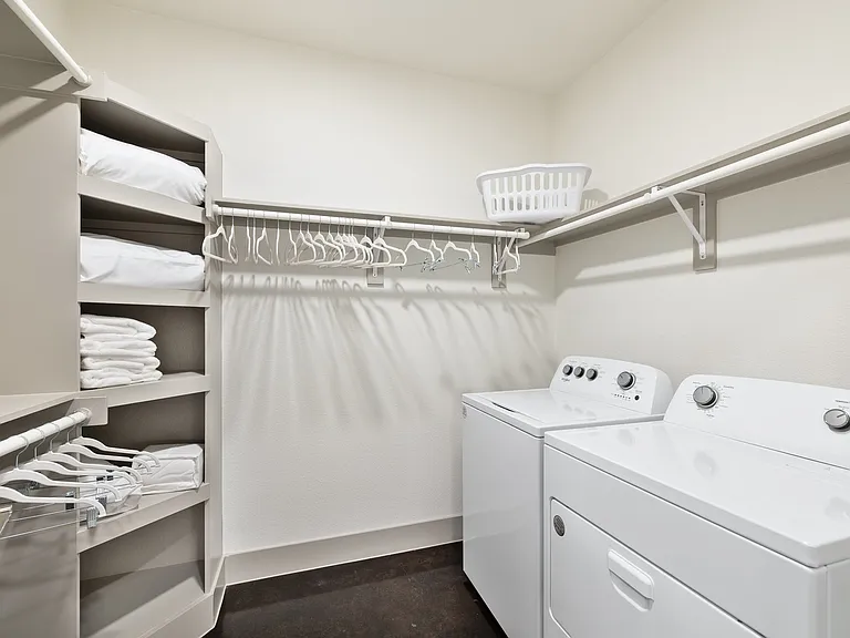 Model Cloest with Full Washer and Dryer