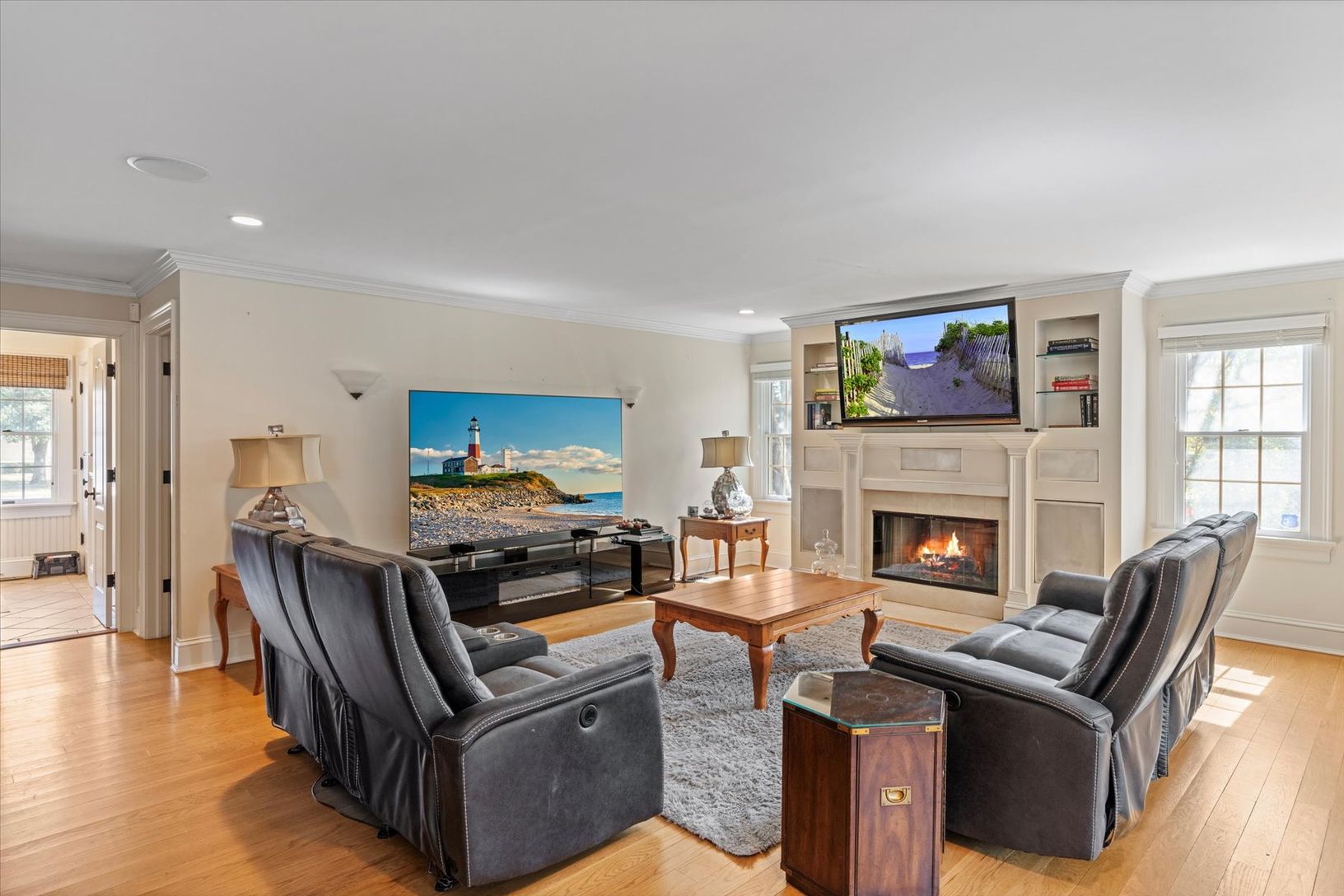  Spacious Living Room with Gas Fireplace, open to Sunroom