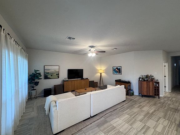 Great open floor plan. Tons of natural light throughout the day. Back windows overlook yard and park.