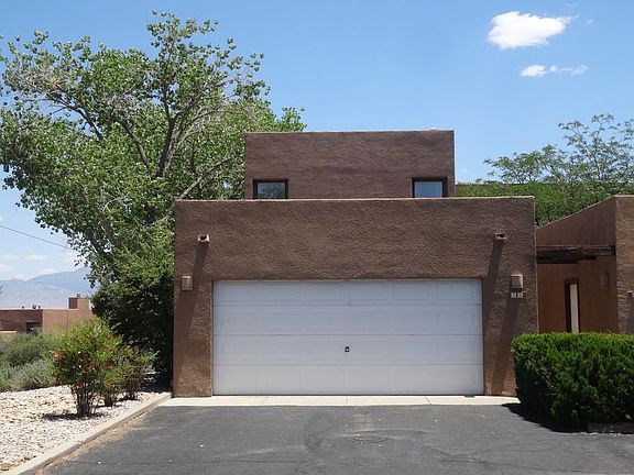 view of townhome from west