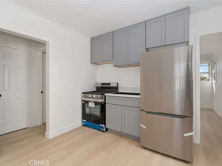 240 1/2 E 84th St #TOWNHOUSE — Photo 1